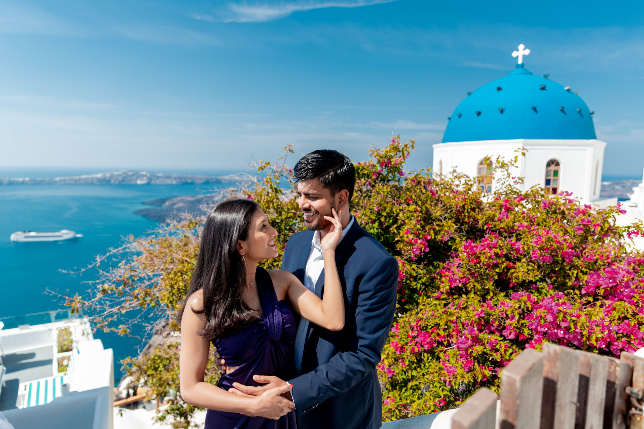 Santorini love story photoshoot. Santorini Photographer. Santorini. Santorini Photoshoot. Flying Dress Photoshoot in Santorini. Santorini Photography. Proposal Santorini